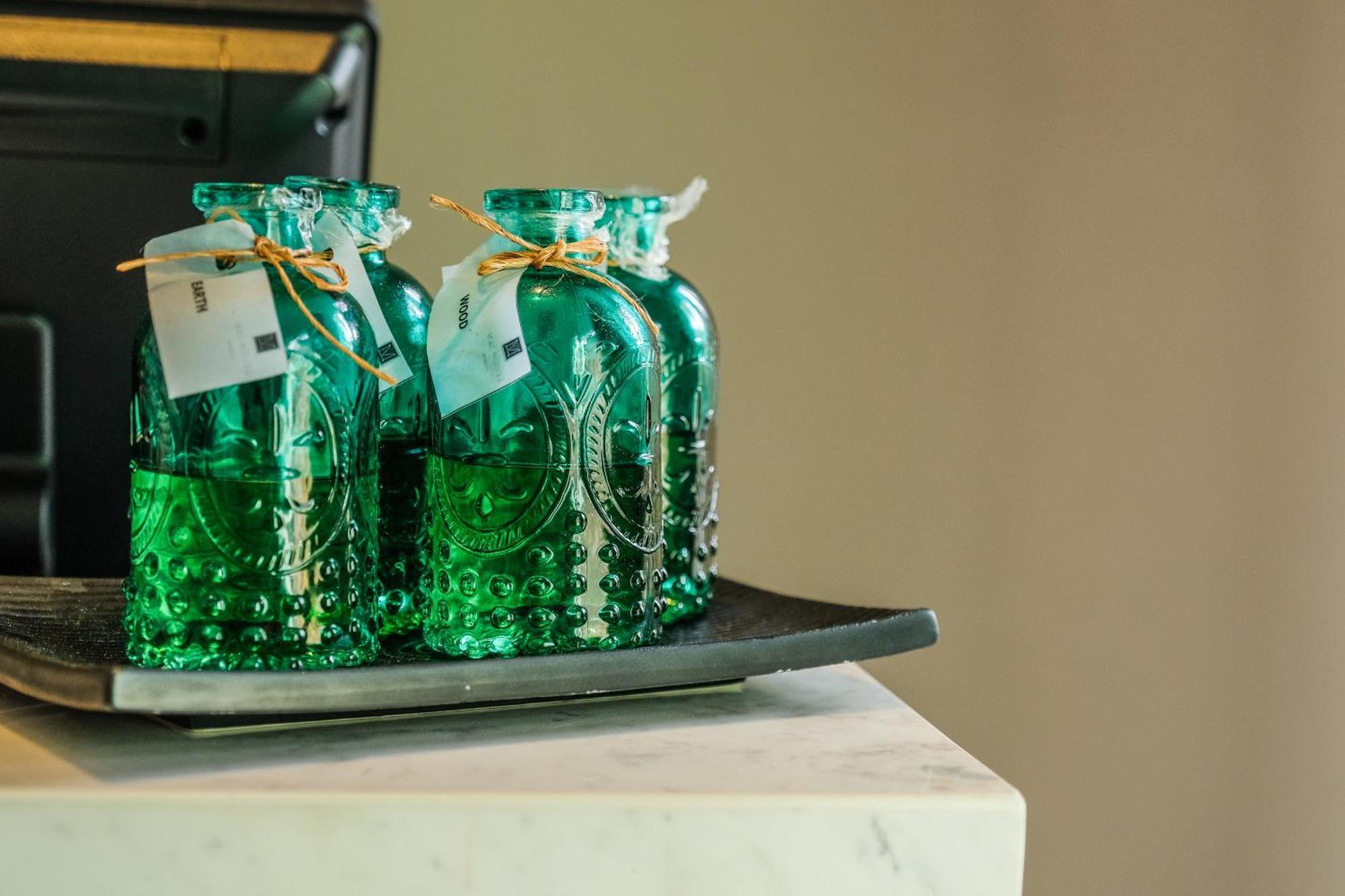 Fusion Suites Phuket Patong Kültér fotó Bottles of absinthe