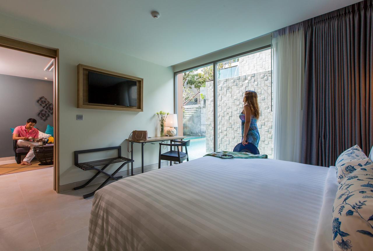 Fusion Suites Phuket Patong Kültér fotó A room at the hotel