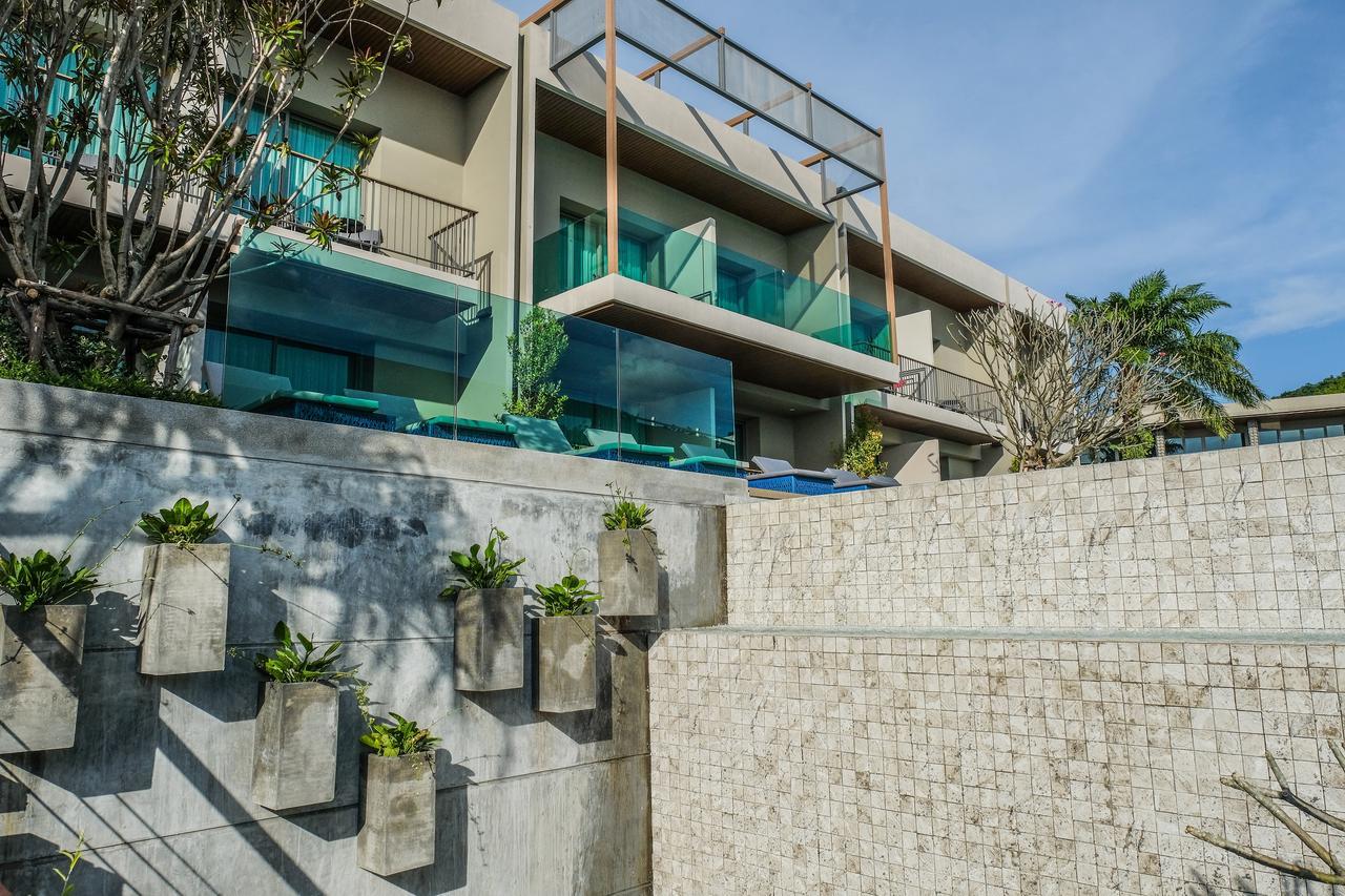 Fusion Suites Phuket Patong Kültér fotó The hotel's pool